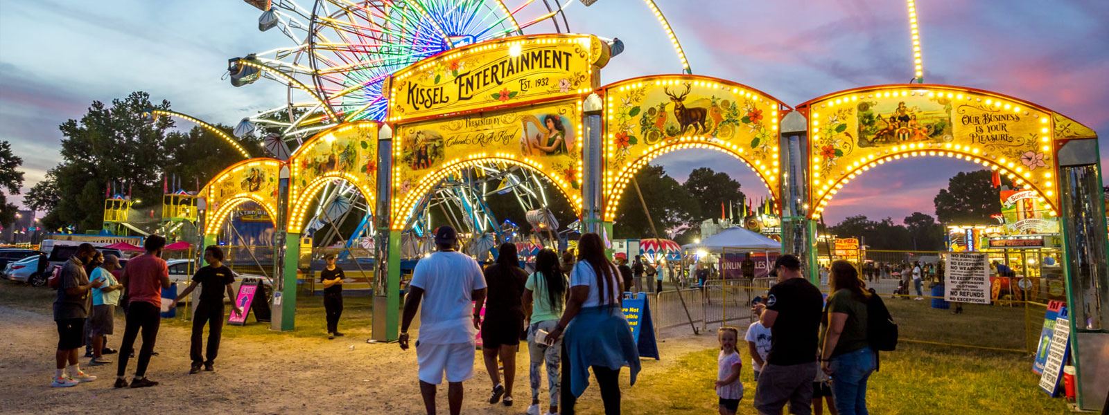 Photo of front gate of a fair